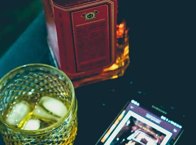whisky with ice cubes in glass
